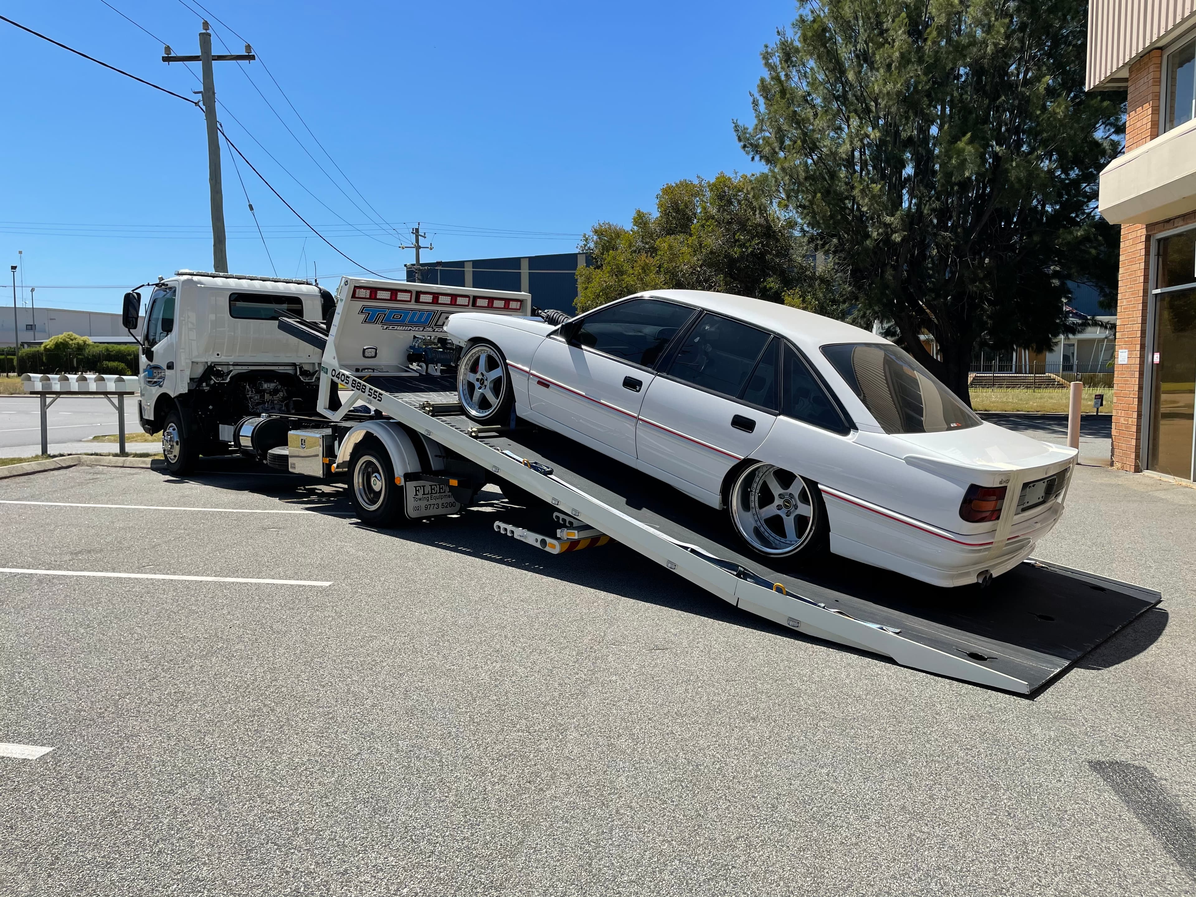 Classic car loading onto Tow Rite flatbed Perth